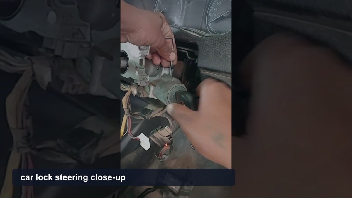 Car Steering Lock: 2 Lock Types, 3 Device Styles, and 4 Unlocking Steps car lock steering close-up